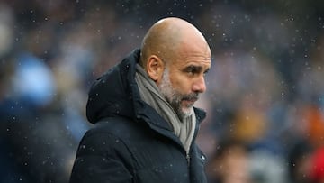 MANCHESTER, ENGLAND - NOVEMBER 28: Pep Guardiola, Manager of Manchester City looks on prior to the Premier League match between Manchester City and West Ham United at Etihad Stadium on November 28, 2021 in Manchester, England. (Photo by Alex Livesey/Getty