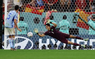 AL RAYYAN, QATAR - DECEMBER 06: Sergio Busquets of Spain watches as his penalty is saved by Yassine Bounou of Morocco in the shoot out after extra time during the FIFA World Cup Qatar 2022 Round of 16 match between Morocco and Spain at Education City Stadium on December 06, 2022 in Al Rayyan, Qatar. (Photo by Clive Brunskill/Getty Images)