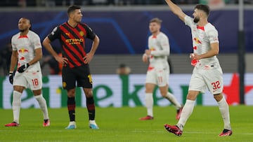 Leipzig's Croatian defender Josko Gvardiol (R) celebrates scoring the 1-1 goal with his team-mates during the UEFA Champions League round of 16, first-leg football match between RB Leipzig and Manchester City in Leipzig, eastern Germany on February 22, 2023. (Photo by Odd ANDERSEN / AFP)