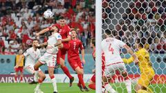 AL RAYYAN, QATAR - NOVEMBER 22: Andreas Christensen of Denmark jumps for the ball with Dylan Bronn of Tunisia during the FIFA World Cup Qatar 2022 Group D match between Denmark and Tunisia at Education City Stadium on November 22, 2022 in Al Rayyan, Qatar. (Photo by Justin Setterfield/Getty Images)