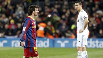 Cristiano y Messi durante un clásico.