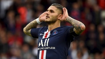 Paris Saint-Germain's Argentine forward Mauro Icardi celebrates after scoring a goal during the French L1 football match between Paris Saint-Germain and Angers SCO at the Parc des Princes stadium in Paris on October 5, 2019. (Photo by Lucas BARIOULE