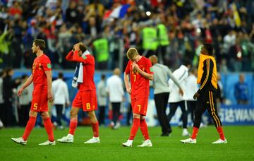 Los jugadores belgas desolados tras la eliminación.