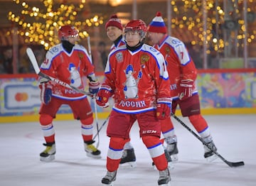 Vladimir Putin took part in the traditional Christmas day ice hockey exhibition match in Red Square and led his side to victory, scoring eight times in an 8-5 victory, according to the Associated Press and Reuters, although the Kremlin match report credit