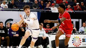 MINNEAPOLIS, MINNESOTA - MARCH 15: Nick Martinelli #2 of the Northwestern Wildcats drives to the basket against AJ Storr #2 of the Wisconsin Badgers in the first half at Target Center in the Quarterfinals of the Big Ten Tournament on March 15, 2024 in Minneapolis, Minnesota.   David Berding/Getty Images/AFP (Photo by David Berding / GETTY IMAGES NORTH AMERICA / Getty Images via AFP)