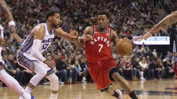 Dec 17, 2017; Toronto, Ontario, CAN; Toronto Raptors guard Kyle Lowry (7) controls a ball as Sacramento Kings guard Garrett Temple (17) defends in the third quarter at Air Canada Centre. Mandatory Credit: Nick Turchiaro-USA TODAY Sports