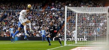 Cristiano Ronaldo rises to head the ball.