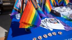 San Fernando, CA - June 01: Flags and pins for attendees during a Progressive Pride Flag raising ceremony on the steps of San Fernando City Hall on Wednesday, June 1, 2022. In June 2021, the San Fernando City Council adopted a Resolution declaring June as Lesbian, Gay, Bisexual, Transgender and Queer Pride Month (LGBTQ+) in the City of San Fernando. Progressive Pride Flags will be flown at all City facilities and in the Downtown Mall throughout the month of June 2022 to support Pride Month. (Photo by Hans Gutknecht/MediaNews Group/Los Angeles Daily News via Getty Images)