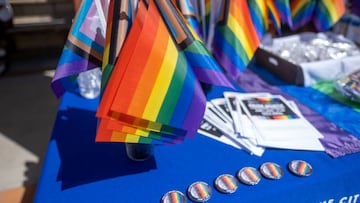 San Fernando, CA - June 01: Flags and pins for attendees during a Progressive Pride Flag raising ceremony on the steps of San Fernando City Hall on Wednesday, June 1, 2022. In June 2021, the San Fernando City Council adopted a Resolution declaring June as Lesbian, Gay, Bisexual, Transgender and Queer Pride Month (LGBTQ+) in the City of San Fernando. Progressive Pride Flags will be flown at all City facilities and in the Downtown Mall throughout the month of June 2022 to support Pride Month. (Photo by Hans Gutknecht/MediaNews Group/Los Angeles Daily News via Getty Images)