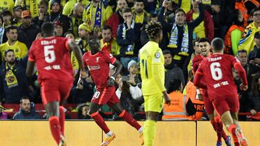 Liverpool's Senegalese striker Sadio Mane celebrates after scoring his team second goal during the UEFA Champions League semi-final first leg football match between Liverpool and Villarreal, at the Anfield Stadium, in Liverpool, on April 27, 2022. (Photo