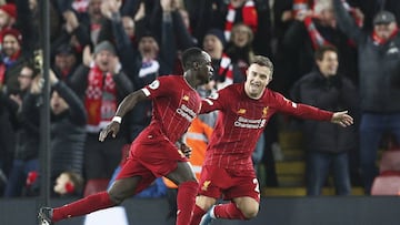 Liverpool forward Sadio Mane (10) celebrates his goal with Xherdan Shaqiri during the English championship Premier League football match between Liverpool and Everton on December 4, 2019 at Anfield in Liverpool, England - Photo Craig Galloway / ProSportsI