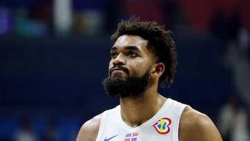 Dominican Republic's Karl-Anthony Towns looks dejected after the match