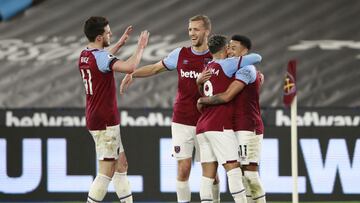 LONDON, ENGLAND - MARCH 08: Jesse Lingard of West Ham United celebrates with team mates Tomas Soucek, Declan Rice and Said Benrahma after scoring their side's first goal during the Premier League match between West Ham United and Leeds United at Lon