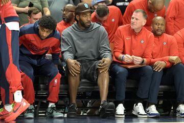 Los Angeles Clippers forward Kawhi Leonard (2) looks on from the bench during a preseason game against the Brooklyn Nets.