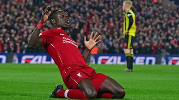 (FILES) In this file photo taken on February 27, 2019 Liverpool's Senegalese striker Sadio Mane celebrates after scoring the opening goal of the English Premier League football match between Liverpool and Watford at Anfield in Liverpool, north west E