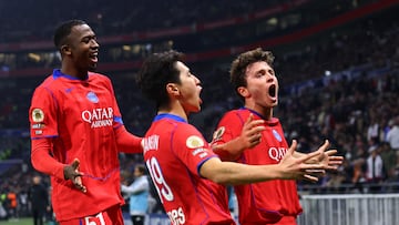 Soccer Football - Ligue 1 - Olympique Lyonnais v Paris St Germain - Groupama Stadium, Lyon, France - November 9, 2025 Paris St Germain's Joao Neves celebrates scoring their third goal with Lee Kang-in and Willian Pacho REUTERS/Manon Cruz