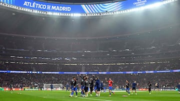 Atletico Madrid's players warm up before the UEFA Champions League last 16 first leg football match between Club Atletico de Madrid and Tottenham Hotspur at Metropolitano Stadium in Madrid on March 10, 2026. (Photo by Javier SORIANO / AFP)