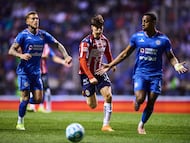 Armando Gonzalez (L) of Guadalajara fights for the ball with Willer Ditta (R) of Cruz Azul during the 7th round match between Cruz Azul and Guadalajara as part of the Liga BBVA MX Varonil, Torneo Clausura 2026 at Cuauhtemoc Stadium, on February 21, 2026 in Puebla, Mexico.