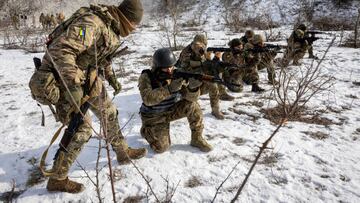 DONBAS, UKRAINE - FEBRUARY 24:  A Ukrainian Army officer instructs replacement troops on February 24, 2023 in the Donbas region of eastern Ukraine. According to the group's commander, the unit was badly depleted in recent weeks of vicious fighting against Russian Wagner mercenary forces, losing more than half its combat strength due to wounded and killed in action. He said that although his troops routinely decimate large groups of enemy forces, who attack his frontline positions in wave after wave of frontal assaults, the Russians still inflict significant damage. Fresh Ukrainian recruits are now being quickly trained, so the unit can return to the frontline at full strength. One year ago, Russia's military invaded Ukraine from three sides and launched airstrikes across the country. Since then, Moscow has withdrawn from north and central parts of Ukraine, focusing its assault on the eastern Donbas region, where it had supported a separatist movement since 2014. (Photo by John Moore/Getty Images)