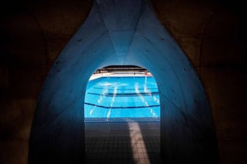 This picture shows diving pool of Tokyo Aquatics Centre, a venue for swimming, diving and artistic swimming of the 2020 Tokyo Olympics and Paralympics Games, during its opening ceremony in Tokyo on October 24, 2020. (Photo by Behrouz MEHRI / AFP)