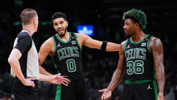 May 1, 2022; Boston, Massachusetts, USA; Boston Celtics forward Jayson Tatum (0) and guard Marcus Smart (36) talk to an official as they take on the Milwaukee Bucks in the second half during game one of the second round for the 2022 NBA playoffs at TD Garden. Mandatory Credit: David Butler II-USA TODAY Sports
