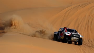 Rallying - Dakar Rally - Stage 13 - Shaybah to Al-Hofuf - Saudi Arabia - January 14, 2023 Toyota Gazoo Racing's Nasser Al-Attiyah and co-driver Mathiu Baumel in action during stage 13 REUTERS/Hamad I Mohammed