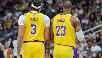 LAS VEGAS, NEVADA - OCTOBER 09: Anthony Davis #3 and LeBron James #23 of the Los Angeles Lakers stand on the court in the first quarter of their preseason game against the Brooklyn Nets at T-Mobile Arena on October 09, 2023 in Las Vegas, Nevada. NOTE TO USER: User expressly acknowledges and agrees that, by downloading and or using this photograph, User is consenting to the terms and conditions of the Getty Images License Agreement.   Ethan Miller/Getty Images/AFP (Photo by Ethan Miller / GETTY IMAGES NORTH AMERICA / Getty Images via AFP)