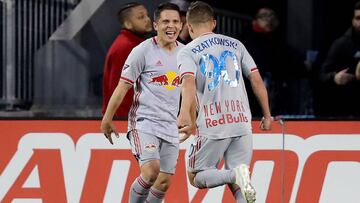 HARRISON, NEW JERSEY - APRIL 27: Connor Lade #5 of New York Red Bulls celebrates his goal with teammate Marc Rzatkowski #90 in the first half against the FC Cincinnati at Red Bull Arena on April 27, 2019 in Harrison, New Jersey.   Elsa/Getty Images/AFP
 =