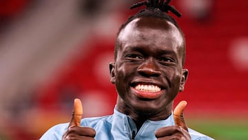 Australia's forward Awer Mabil gives the thumbs up ahead of the FIFA World Cup 2022 play-off qualifier football match between UAE and Australia at Ahmad bin Ali stadium in Qatar's Ar-Rayyan on June 7, 2022. (Photo by KARIM JAAFAR / AFP)