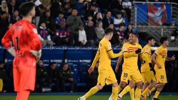 Barcelona's Brazilian forward #19 Vitor Roque celebrates scoring his team's third goal during the Spanish league football match between Deportivo Alaves and FC Barcelona at the Mendizorroza stadium in Vitoria on February 3, 2024. (Photo by Ander Gillenea / AFP)