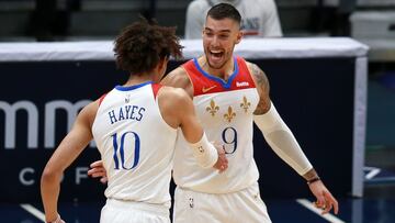 NEW ORLEANS, LOUISIANA - APRIL 09: Jaxson Hayes #10 of the New Orleans Pelicans and Willy Hernangomez #9 of the New Orleans Pelicans react after scoring during the second quarter of an NBA game against the Philadelphia 76ers at Smoothie King Center on April 09, 2021 in New Orleans, Louisiana. NOTE TO : expressly acknowledges and agrees that, by ing and or using this photograph, is consenting to the and conditions of the Getty Images License Agreement. (Photo by Sean Gardner/Getty Images)