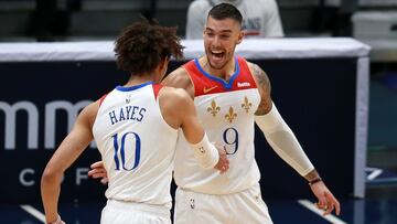 NEW ORLEANS, LOUISIANA - APRIL 09: Jaxson Hayes #10 of the New Orleans Pelicans and Willy Hernangomez #9 of the New Orleans Pelicans react after scoring during the second quarter of an NBA game against the Philadelphia 76ers at Smoothie King Center on April 09, 2021 in New Orleans, Louisiana. NOTE TO USER: User expressly acknowledges and agrees that, by downloading and or using this photograph, User is consenting to the terms and conditions of the Getty Images License Agreement. (Photo by Sean Gardner/Getty Images)