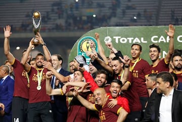 Soccer Football - African Champions League - Esperance Sportive v Wydad Casablanca, Olympique de Rades Stadium, Rades, Tunisia - June 1, 2019 Esperance's Moez ben Cherifia celebrates with the trophy after winning the CAF Champions League