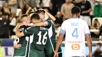Panathinaikos' players celebrate their first goal during the UEFA Champions League first leg of the third qualifying round football match between Panathinaikos and Olympique Marseille (OM) at the Apostolos Nikolaidis stadium in Athens on August 9, 2023. (Photo by SPYROS BAKALIS / AFP)