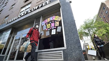 May 15, 2020 - New York, NY USA: The Starbucks coffee shop on the corner of Lexington and 63rd St., NYC., says "Welcome Back" to their customers has they reopen their doors after being closed due to the coronavirus. (Matthew McDermott/CONTACTO)