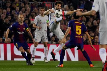 Sergio Busquets y Cesc Fábregas.