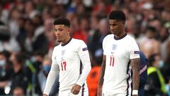 FILE PHOTO: Soccer Football - Euro 2020 - Final - Italy v England - Wembley Stadium, London, Britain - July 11, 2021 England's Marcus Rashford and Jadon Sancho prepare to come on as substitutes Pool via REUTERS/Carl Recine/File Photo