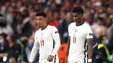 FILE PHOTO: Soccer Football - Euro 2020 - Final - Italy v England - Wembley Stadium, London, Britain - July 11, 2021 England's Marcus Rashford and Jadon Sancho prepare to come on as substitutes Pool via REUTERS/Carl Recine/File Photo