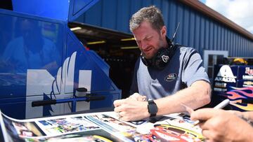 BROOKLYN, MICHIGAN - AUGUST 09: Dale Earnhardt Jr. signs autographs during practice for the Monster Energy NASCAR Cup Series Consumers Energy 400 at Michigan International Speedway on August 09, 2019 in Brooklyn, Michigan.   Stacy Revere/Getty Images/AFP
 == FOR NEWSPAPERS, INTERNET, TELCOS &amp; TELEVISION USE ONLY ==