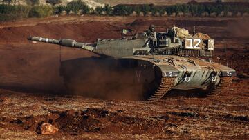 An Israeli soldier in a tank participates in a military drill near Israel's border with Lebanon in northern Israel, October 26, 2023. REUTERS/Lisi Niesner