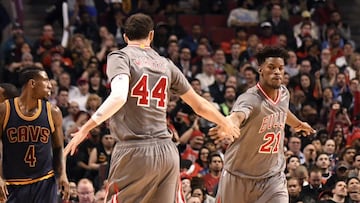 Mar 30, 2017; Chicago, IL, USA; Chicago Bulls forward Jimmy Butler (21) and  forward Nikola Mirotic (44) celebrate a basket during the second half at the United Center. The Bulls won 99-93. Mandatory Credit: David Banks-USA TODAY Sports