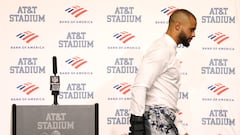 ARLINGTON, TEXAS - SEPTEMBER 11: Quarterback Dak Prescott #4 of the Dallas Cowboys walks away from the podium during the post-game press conference after a 19-3 loss against the Tampa Bay Buccaneers at AT&T Stadium on September 11, 2022 in Arlington, Texas. Prescott left the game with a hand injury in the fourth quarter.   Tom Pennington/Getty Images/AFP