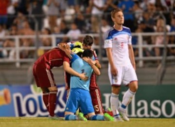 Jorge Meré, Antonio Sivera and Jesús Vallejo of Spain celebrate following their UEFA European Under-19 Championship final against Russia