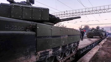 This handout video grab released by the Russian Defence Ministry on February 15, 2022, shows Russian tanks leaving for Russia after joint exercises of the armed forces of Russia and Belarus as part of an inspection of the Union State&#039;s Response Force