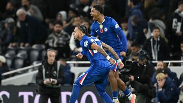 Chelsea's French defender #29 Wesley Fofana (R) and Chelsea's French defender #27 Malo Gusto celebrate the team's win in the English Premier League football match between Tottenham Hotspur and Chelsea at the Tottenham Hotspur Stadium in London, on November 1, 2025. (Photo by JUSTIN TALLIS / AFP) / RESTRICTED TO EDITORIAL USE. No use with unauthorized audio, video, data, fixture lists, club/league logos or 'live' services. Online in-match use limited to 120 images. An additional 40 images may be used in extra time. No video emulation. Social media in-match use limited to 120 images. An additional 40 images may be used in extra time. No use in betting publications, games or single club/league/player publications. /