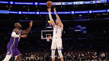 Oklahoma City Thunder guard Alex Caruso (9) shoots the ball over Los Angeles Lakers forward LeBron James (23) during the second quarter at Crypto.com Arena.