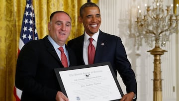 U.S. President Barack Obama (R) honors Spanish-born chef and restauranteur Jose Andres with the Outstanding American by Choice award during a naturalization ceremony for members of the U.S. military and military spouses at the White House in Washington July 4, 2014. Andres became a U.S. citizen in 2013.  REUTERS/Jonathan Ernst    (UNITED STATES - Tags: POLITICS MILITARY)CODE: X01676