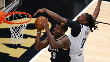 ATLANTA, GEORGIA - JANUARY 18: Clint Capela #15 of the Atlanta Hawks attacks the basket against Naz Reid #11 of the Minnesota Timberwolves during the first half at State Farm Arena on January 18, 2021 in Atlanta, Georgia. NOTE TO USER: User expressly acknowledges and agrees that, by downloading and or using this photograph, User is consenting to the terms and conditions of the Getty Images License Agreement. Kevin C. Cox/Getty Images/AFP
== FOR NEWSPAPERS, INTERNET, TELCOS & TELEVISION USE ONLY ==