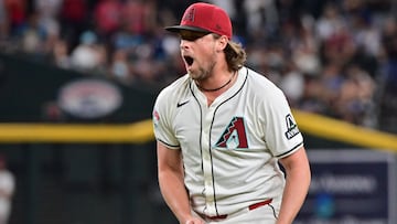 Sep 25, 2024; Phoenix, Arizona, USA; Arizona Diamondbacks pitcher Kevin Ginkel (37) celebrates after beating the San Francisco Giants at Chase Field. Mandatory Credit: Matt Kartozian-Imagn Images
