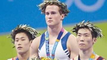 <b>UN PODIO EN EL AIRE. </b>Paul Hamm sabrá hoy si su oro es definitivo,